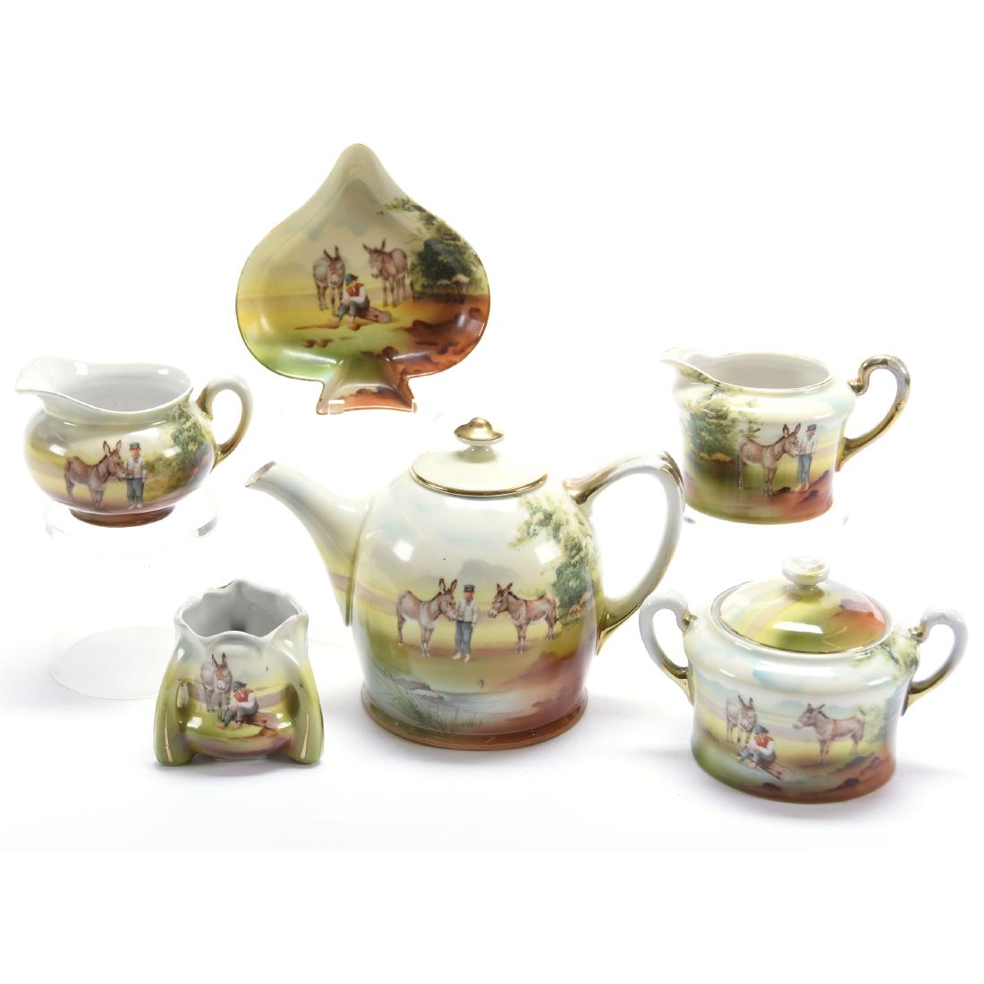 (6) Boy & Donkey Scenic Items Royal Bayreuth: (6) Boy & Donkey Scenic Items - Royal Bayreuth - (1) 5.25" Tea Pot - (1) Creamer and Matching Sugar Set - (1) 2.5" Toothpick Holder - (1) 4.75" Spade - Shaped Dish - (1) Creamer - All Blue Mark