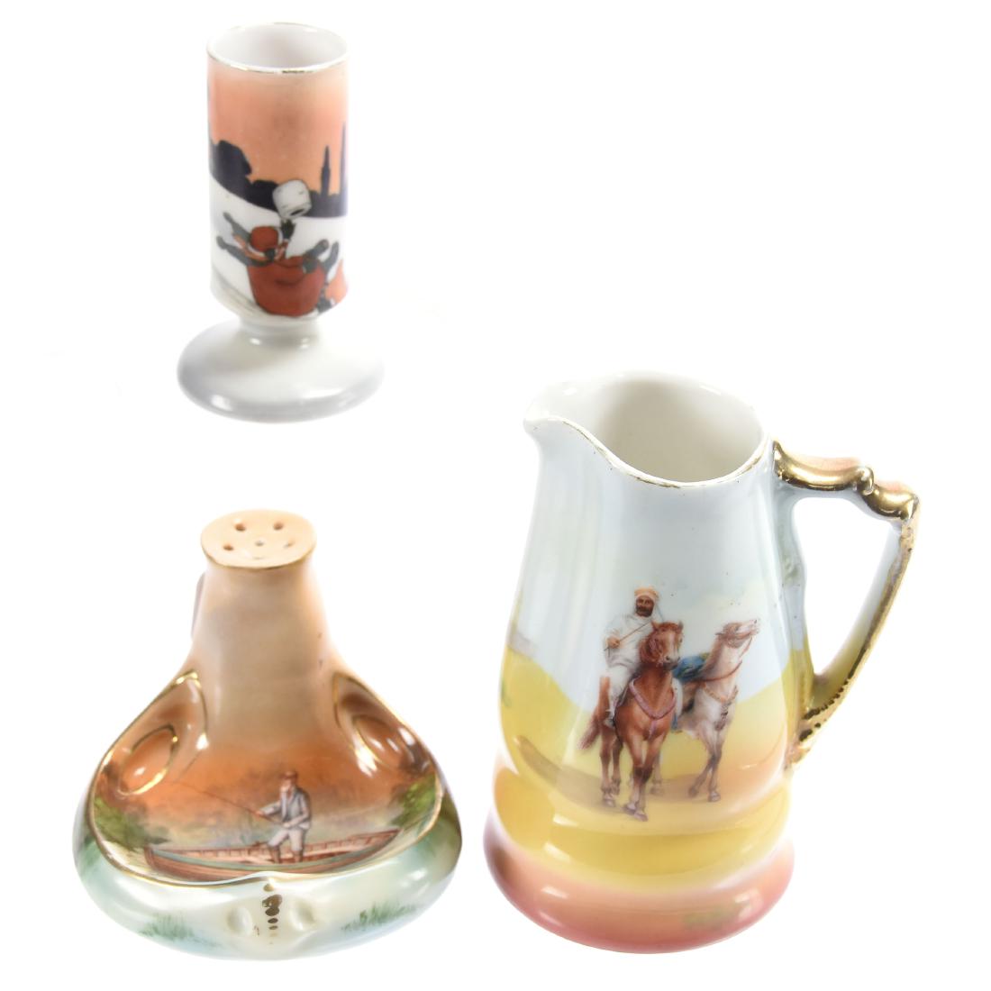 (3) Scenic Items Royal Bayreuth: (3) Scenic Items - Royal Bayreuth - (1) 4.25" Creamer, Arab Horse Rider - (1) 3" Pedestal Toothpick, Children Playing in Snow Scenic Decor - (1) 2.5" Hatpin Holder, Man Fishing in Boat