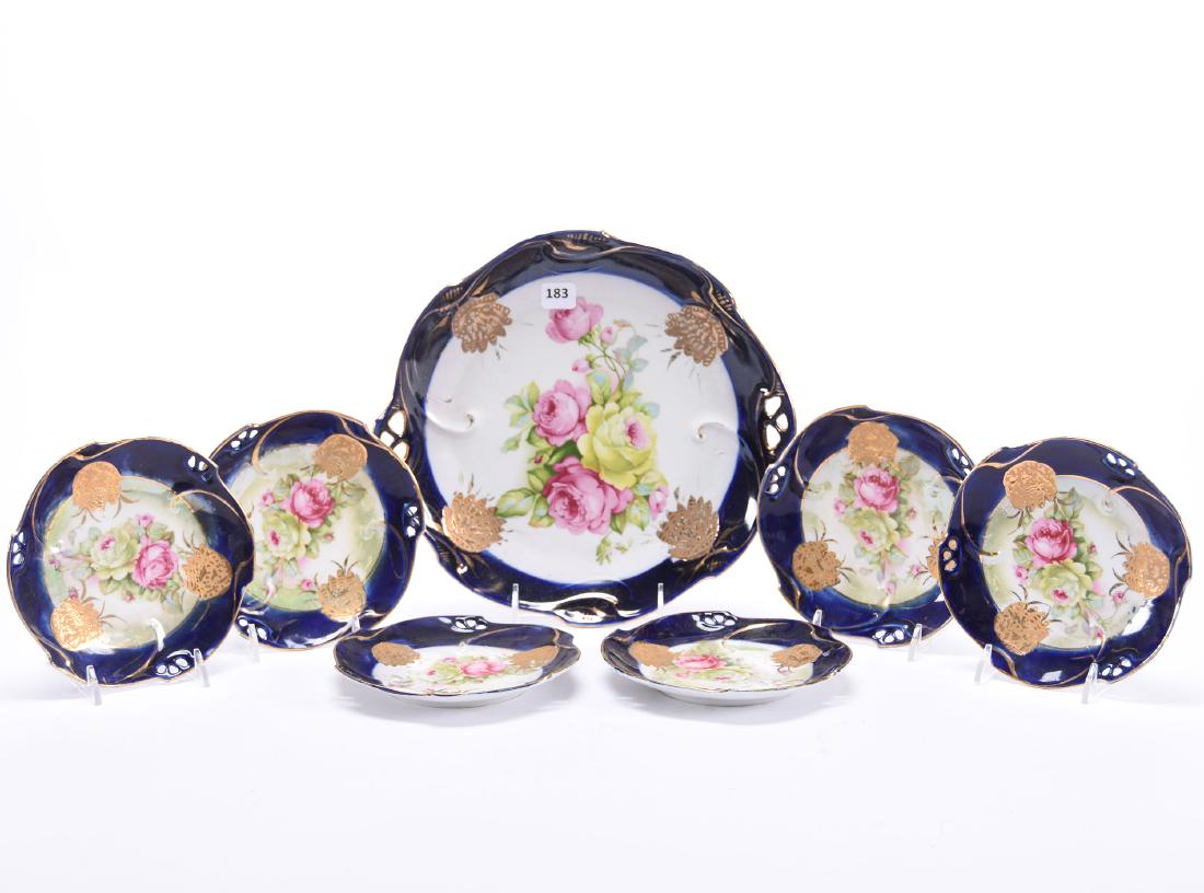 Cake Set, Germany, Rose Decor: Germany Cake Set, 10.75" Cake Plate, White with Cobalt Blue Border, Rose Decor and Gold Trim Highlights; (6) Matching 6" Dessert Plates, All Items have Some Missing Gold & Normal Wear