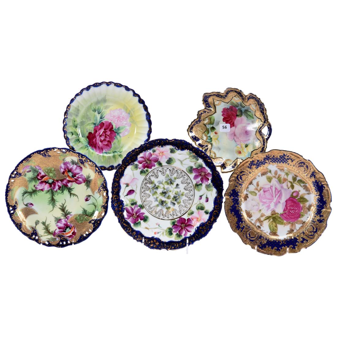(5) Nippon & Nippon Style Items: (5) Nippon & Nippon Style Items, All Have Floral Decor and Cobalt Blue Trim; (4) Plates Ranging in Size from 9.5" to 7.5"; (1) 7" Leaf Shaped Bowl