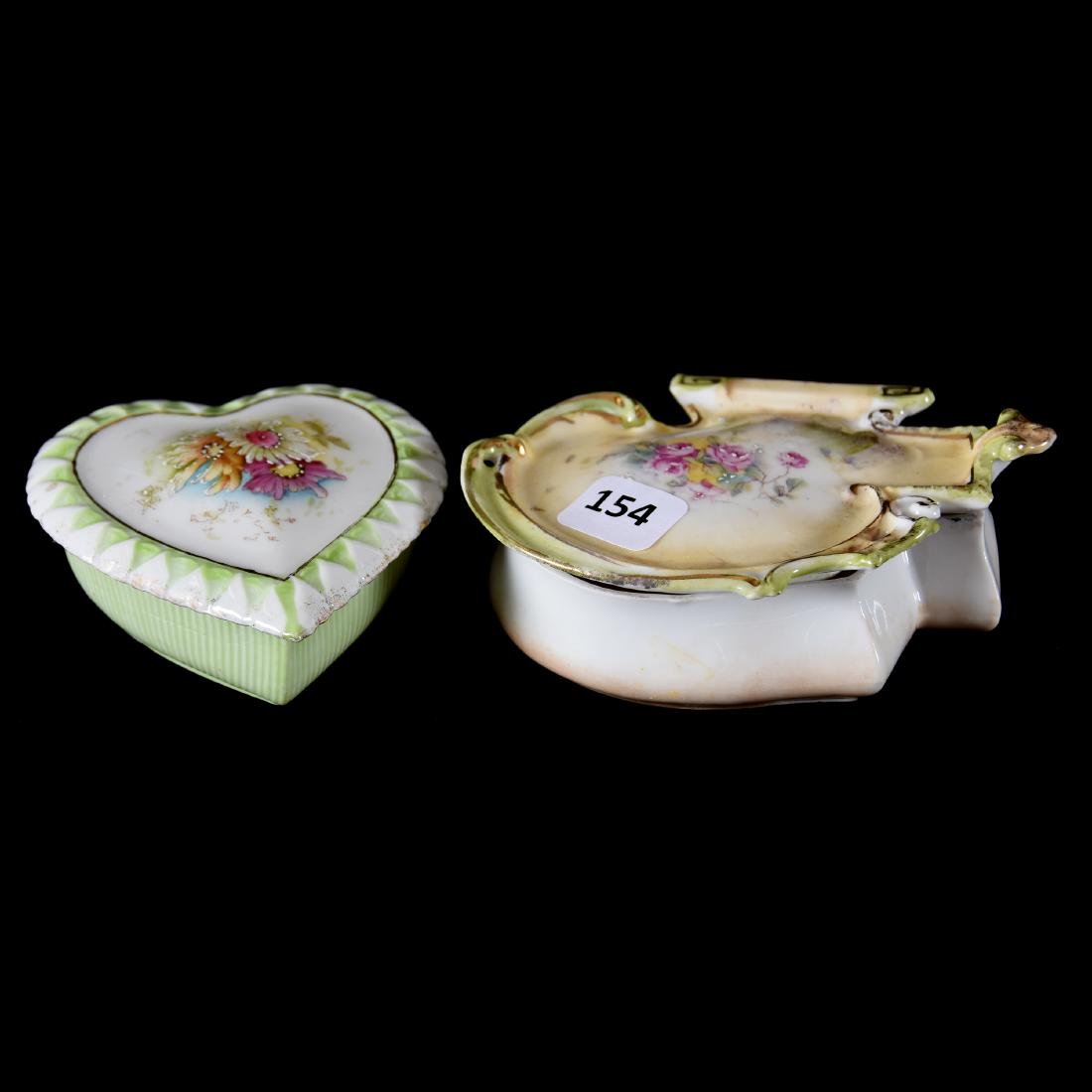 (2) Unmarked Prussia Covered Boxes: (2) Unmarked Prussia Covered Boxes; (1) 4.5", Cream, Green and White Tones with Pink Rose Decor, Unique Mold, Nice Quality; (1) 3.75", Heart Shape, White and Green Tones with Daisy Decor
