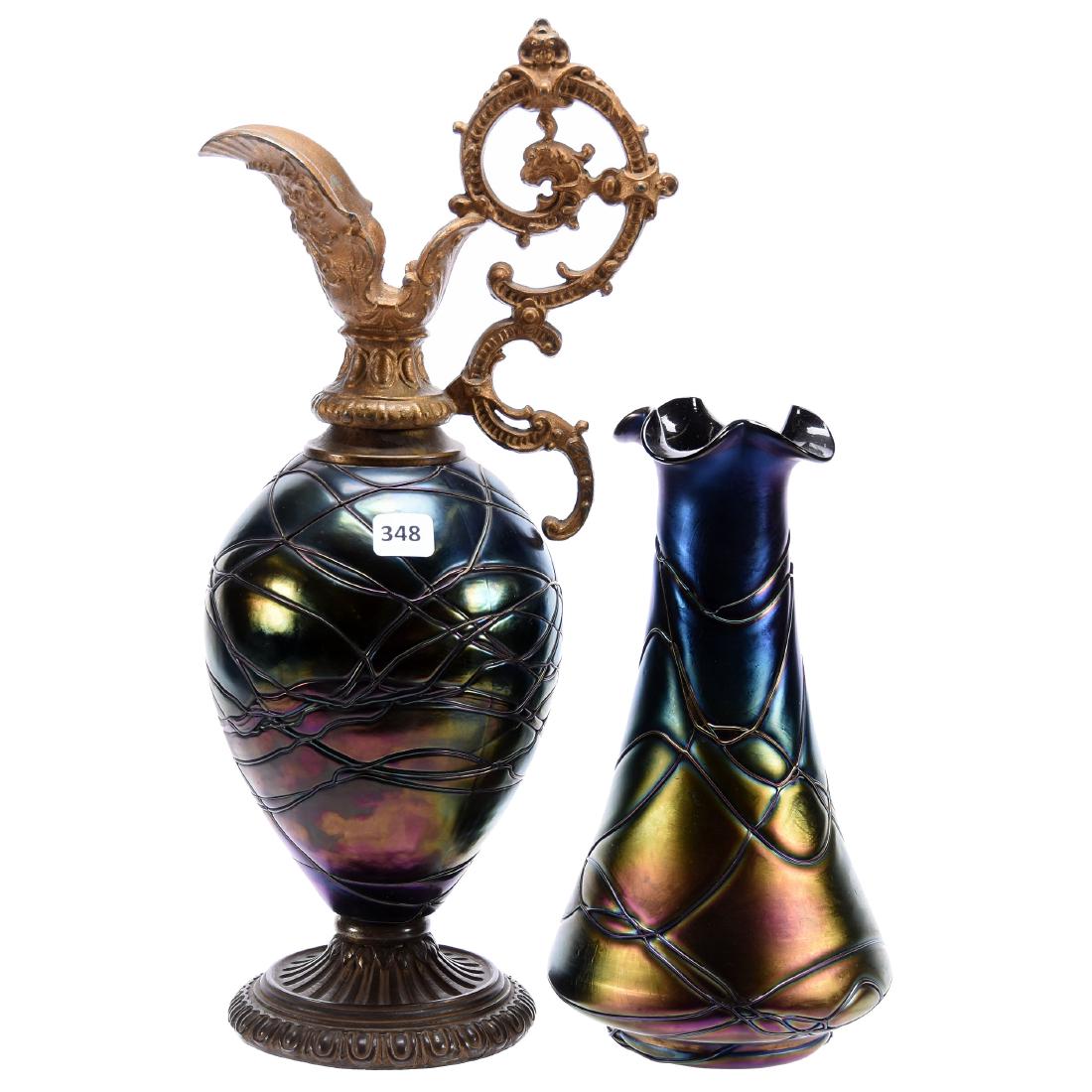 (2) Art Glass Iridescent Items: (2) Art Glass Iridescent Items; (1) 15.5" Ewer with Deep Purple Threaded Body, Gilt Metal Base, Spout and Handle; (1) 10" Deep Purple Threaded Vase, Both Attributed to Pallme-Koenig