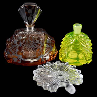 (2) Perfume Bottles, Czechoslovakia: (2) Czechoslovakia Art Glass Perfume Bottles; (1) 5.25" X 4.75" Pink Tones with Silver Overlay Featuring Design of Basket and Flowers, Stopper Plug Has Significant Damage; (1) 3.5" Vaseline Bottle,