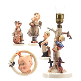 (4) Figurines & Lamp, Hummel: Hummel Lamp and; (4) Figurines; (1) #44/A, Culprits Table Lamp; (1) #192/0 Candlelight; (1) #186 Sweet Music; (1) Boy Holding Boot, Unmarked; (1) #30/0b Ba-Bee Ring, TMK #2