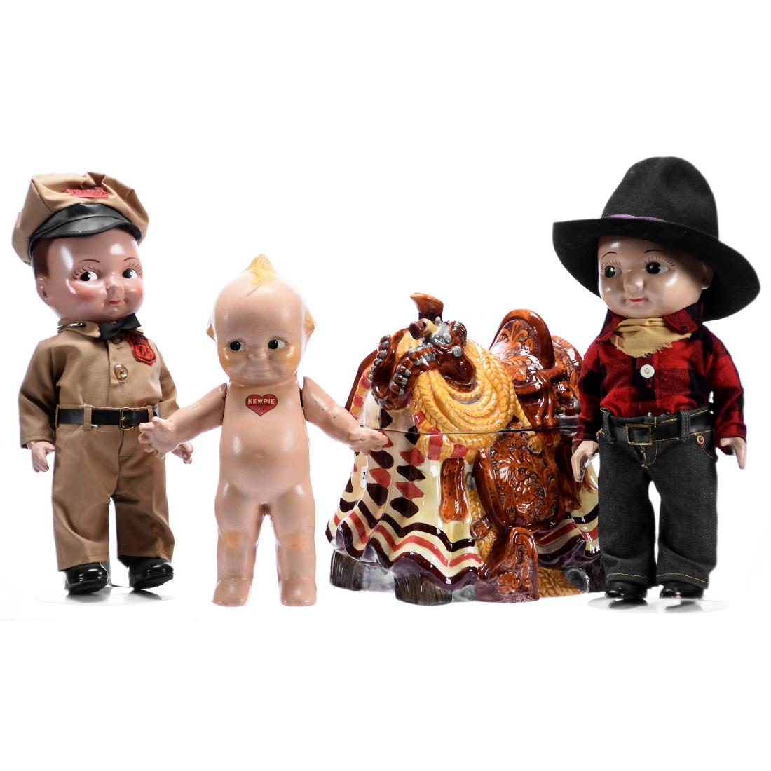 (3) Dolls & Modern Cookie Jar: (3) Dolls and Modern Cookie Jar; (1) 12.5" Buddy Lee Cowboy; (1) Unmarked Modern Western Saddle Cookie Jar; (One Small Glaze Flake); (1) 11" Original Composition Kewpie; (1) Collector's Series Doll "L