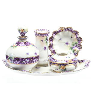 Five Piece Dresser Set Marked R.C. Nippon: Five Piece Marked Dresser Set Marked R.C. Nippon, 11.5" Tray, White with Violet Floral Decor, Matching 6" Cologne Bottle, 4.5" Hatpin Holder, 4.5" Ruffled Dish, 4" Hair Receiver with Hairline in Lid