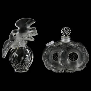 (2) Perfume Bottles Marked Lalique France: (2) Perfume Bottles Marked Lalique France; (1) 4" with Turtledoves Stopper; (1) 3.75" X 3.75" Deux Fleurs Design