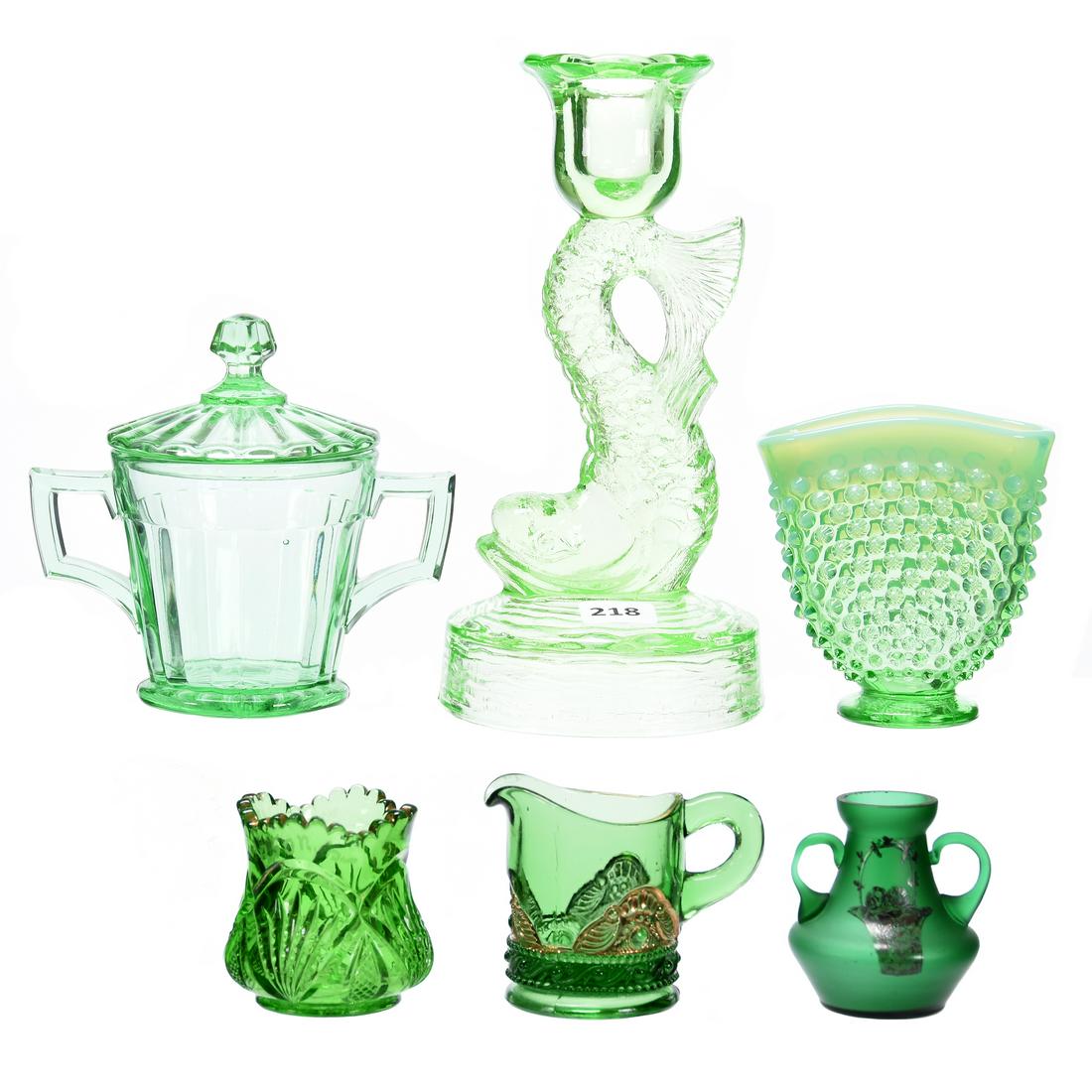 (6) Assorted Green Art Glass Items: (6) Assorted Green Art Glass Items Including (1) 7.75" Dolphin Candlestick; (1) Opalescent Hobnail Fan Vase, and More, See Photos for Details