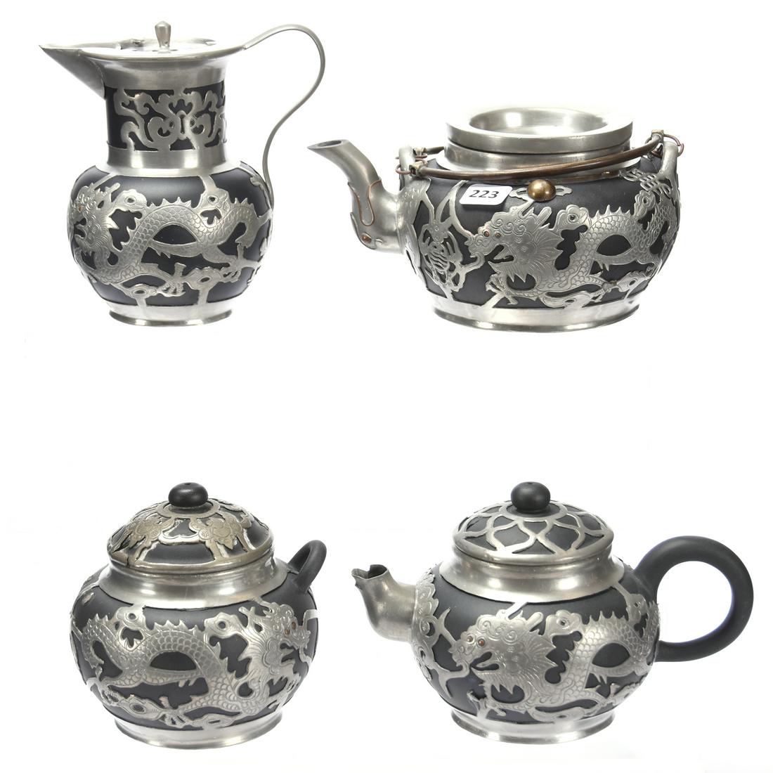 (4) Piece Set Ebony Oriental Set, Silver Overlay: (4) Piece Set Ebony Oriental Set with Silver Overlay, All Have Dragon Motif, All Marked with Chinese Characters on Base, Two Lids Have Significant Damage, Sugar Bowl Has One Handle Gone
