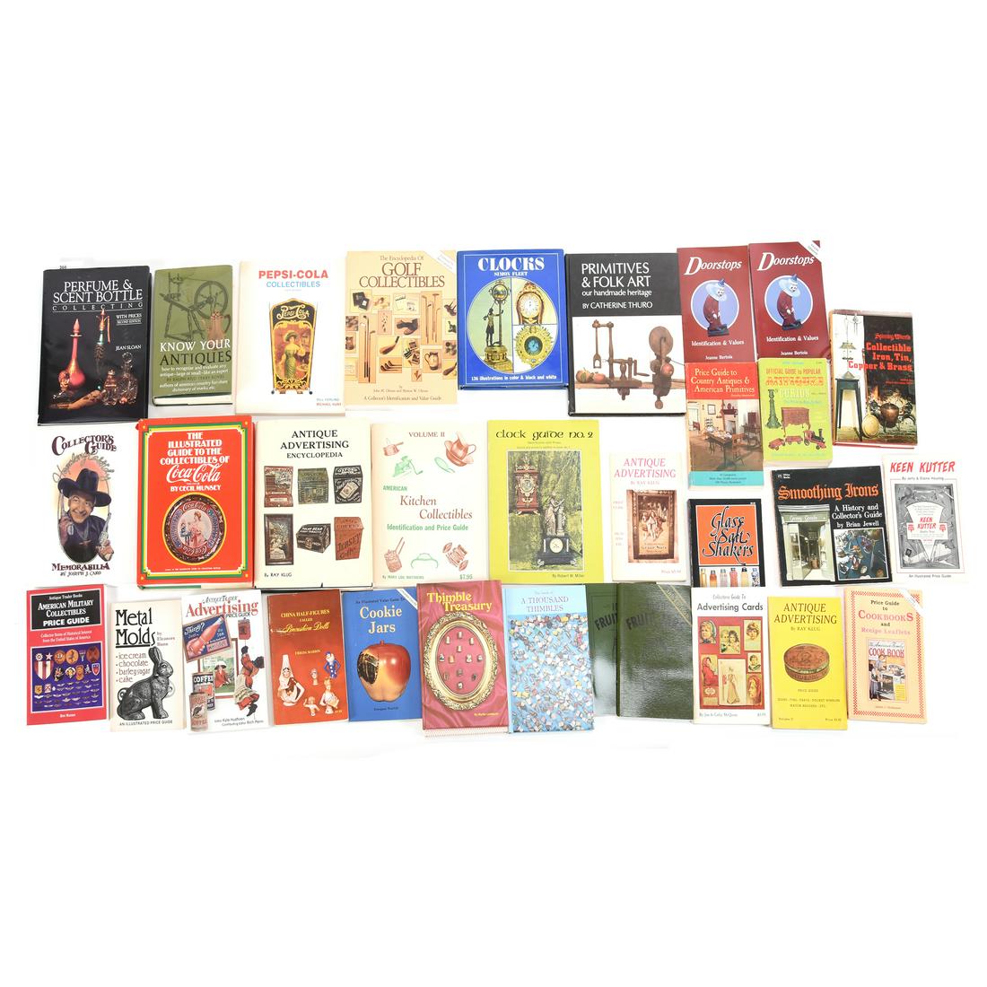 Over (20) Books About Antiques and Collectibles: Over (20) Books About Antiques and Collectibles Including: Doorstops Identification & Values by Jeanne Bertoia; Glass Salt Shakers by Arthur G. Peterson; Antique Advertising by Ray Klug; Clocks by Sim