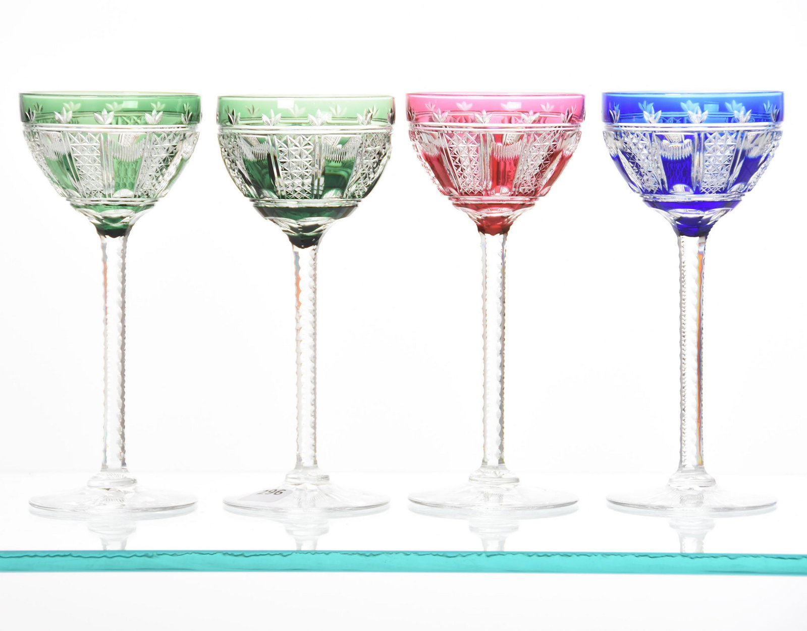 (4) Wine Stems, Val St. Lambert: (4) Wine Stems by Val St. Lambert, BPCG 7.5" Asten Pattern, Circa 1925, Diamond Cut Stem, Flashed Foot; (1) Cobalt, (2) Emerald, (1) Cranberry
