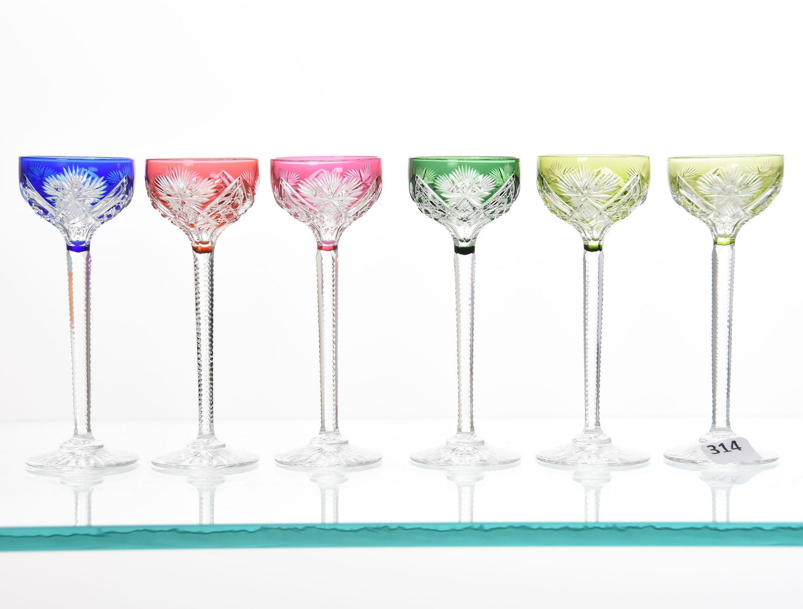 (6) Cordial Stems, Val St. Lambert: (6) Cordial Stems by Val St. Lambert, BPCG, 5.25" Remagen Pattern, Circa 1925, Clear Notched Stem, Ray Cut Foot; (2) Green, (1) Cobalt, (1) Cranberry, (1) Rose, (1) Emerald