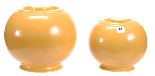 (2) Ball Jars, Vintage Fiesta Kitchen Kraft, Yellow: (2) Ball Jars, Vintage Fiesta Kitchen Kraft, Yellow; (1) Large 7" Repair on Interior Ring of Lid, Small Glaze Nick on Base; (1) Medium 6" Small Glaze Nick on Base; Circa 1940, Don Dukeman Collection