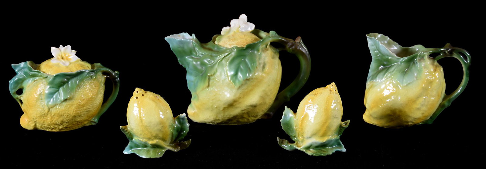 (5) Figural Lemon Items by Royal Bayreuth: (5) Figural Lemon Items by Royal Bayreuth; (3) Marked, (2) Unmarked; 4.75" Tea Pot, Marked; (Inside Rim Chip); 4" Cream, Marked; 3.75"Sugar, Marked; 3" Salt & Pepper, Unmarked; Circa 1920's, Don Dukem
