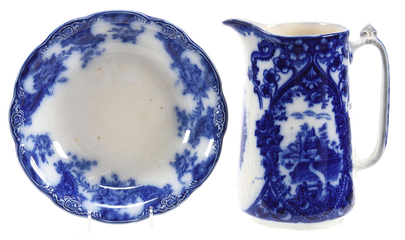 (2) Flow Blue Ironstone Items: (2) Flow Blue Ironstone Items; (1) 8.5" Pitcher, Chelsea Pattern; (1) 9" Bowl, Lois Pattern; Circa 1900's, Don Dukeman Collection