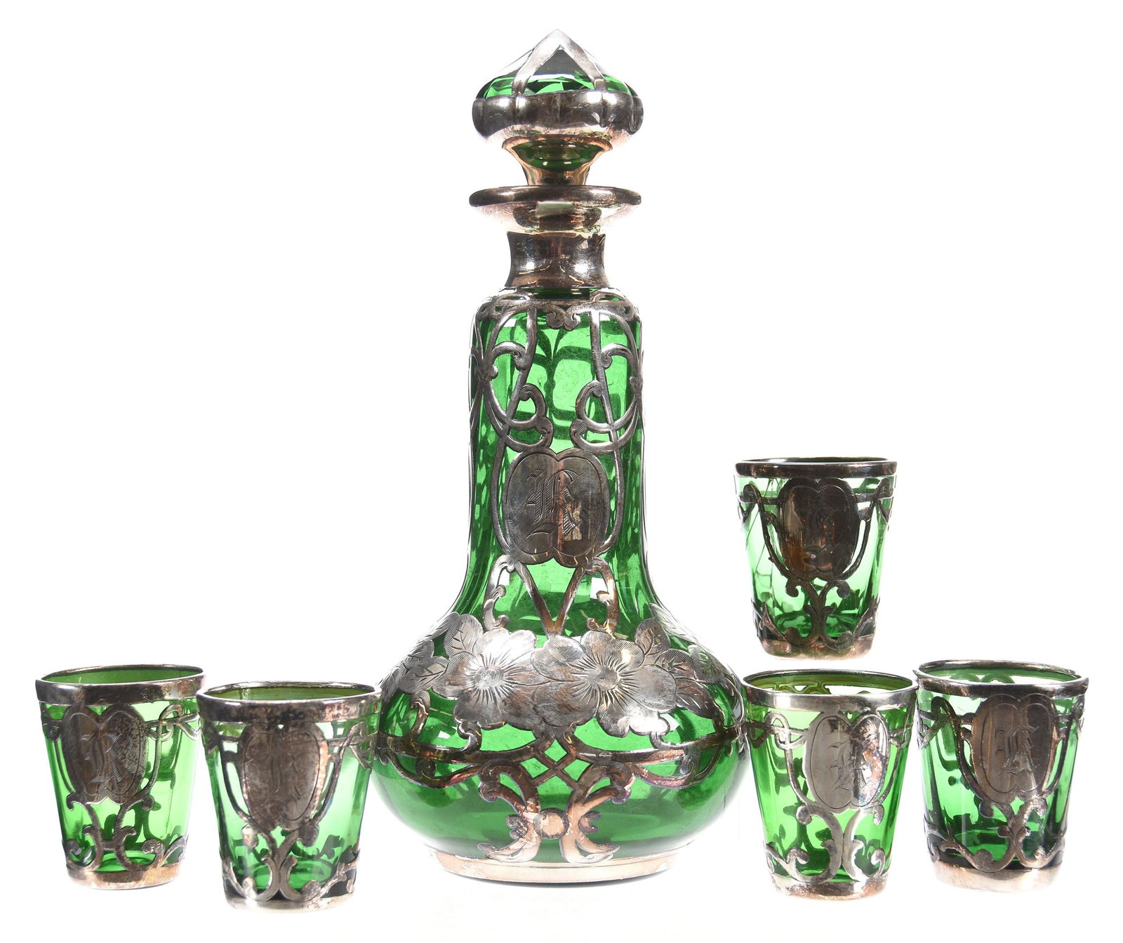 Decanter Set, Solid Green, Sterling Overlay: Decanter Set, Solid Green, Sterling Overlay, 8.25" Decanter, Elaborate Sterling Scroll & Floral Design, Matching Stopper; (5) 2" Shot Glasses; (3) Shot Glasses Cracked; Circa 1920's, Margaret and the 