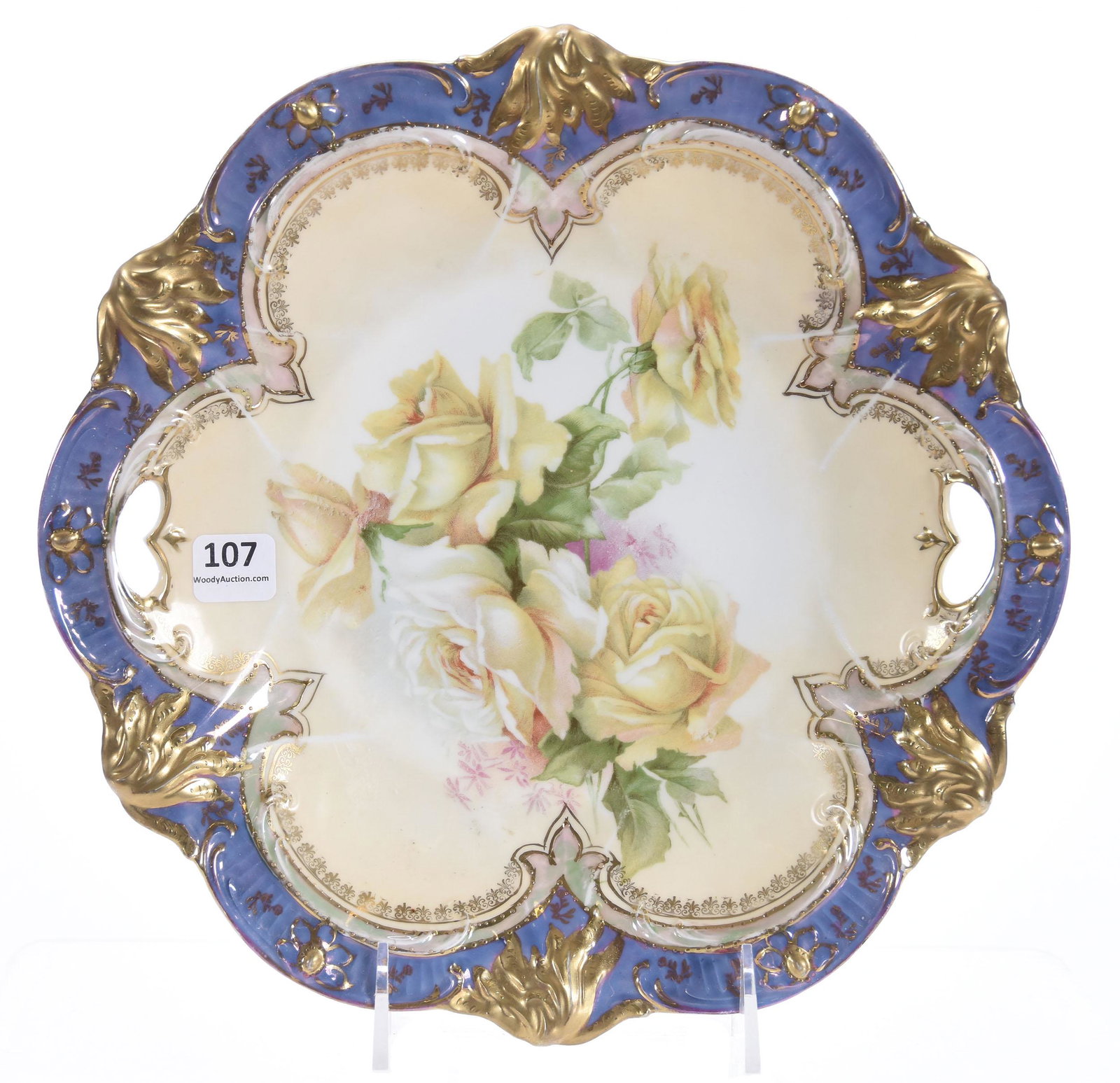 Cake Plate, Marked RSP, Mold 215, Rose Scene: Cake Plate, marked R.S. Prussia, mold 215; 10.5" Yellow Rose scene, cream center, iridescent lavender border, great gold highlights; Private Collection, Kansas