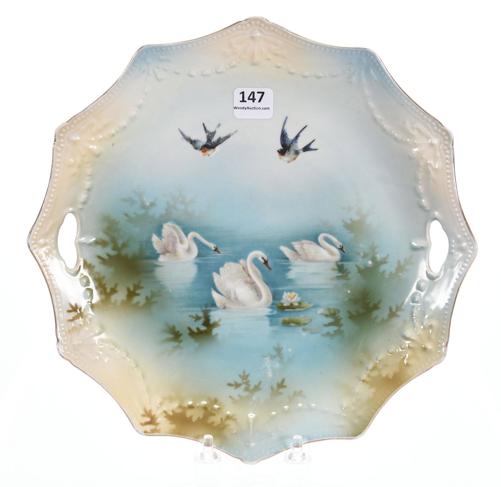 Cake Plate, Marked RSP, Swag & Tassel Mold: Cake Plate, marked R.S. Prussia, Swag & Tassel mold; 10" double scene; Swan & Bluebird scenes, blue & cream tones; Libbie Krug Collection, Iowa