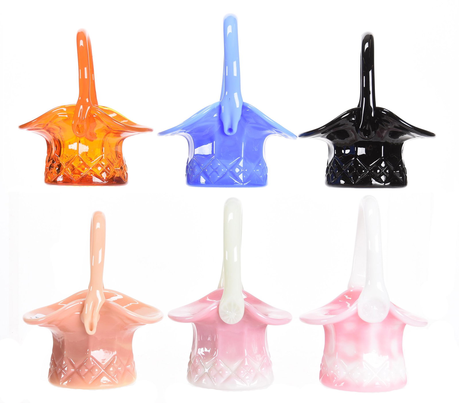 (6) marked Gibson Art Glass Baskets: (6) marked Gibson Art Glass Baskets range from 4" - 4.5" (3) Burmese colored; (1) Blue agate; (1) Amberina; (1) Black - all same pattern; Nancy Rublaitus Estate