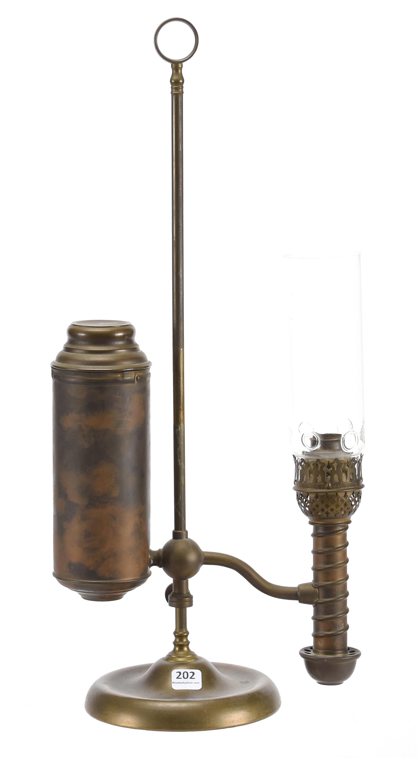 Brass student lamp with unique cylinder chimney: Brass student lamp with unique cylinder chimney 20.5" Adjustable height, no burner fixture insert; Wilson Collection, Missouri