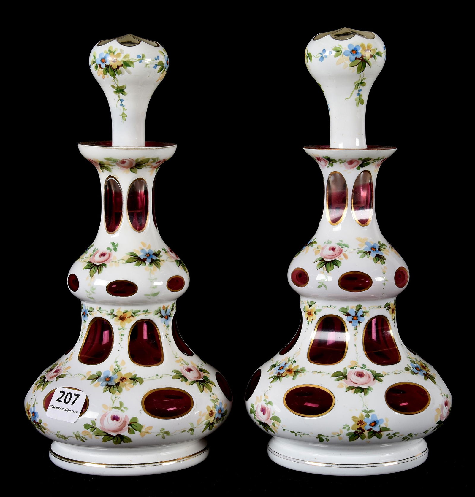 Pair Bohemian cranberry with white overlay decanters (1 of 3)