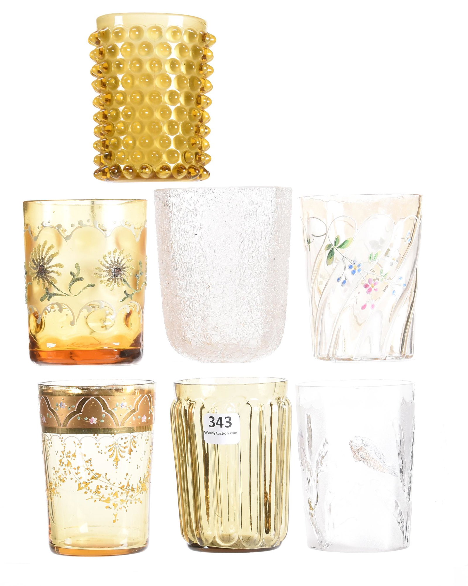(7) Art glass tumblers, amber & clear colors: (7) Art glass tumblers, amber & clear colors various sizes Includes: (1) 4" Overshot ten sided by Sandwich; (1) 3.75" Fish & Coral in the style of Pomona; (1) 3.75" Amber cased hobnail (crack on one c