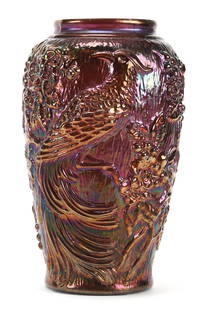 Contemporary Fenton Carnival Glass Aubergine Vase: Contemporary Fenton carnival glass Aubergine vase; 9.5" Bird of paradise mold, purple; Bill Maxton Collection, Illinois