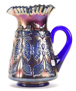 Carnival Glass Pitcher, Butterfly & Fern Pattern: Carnival glass pitcher, Butterfly & Fern pattern; 9.5" Blue - Fenton; Bill Maxton Collection, Illinois