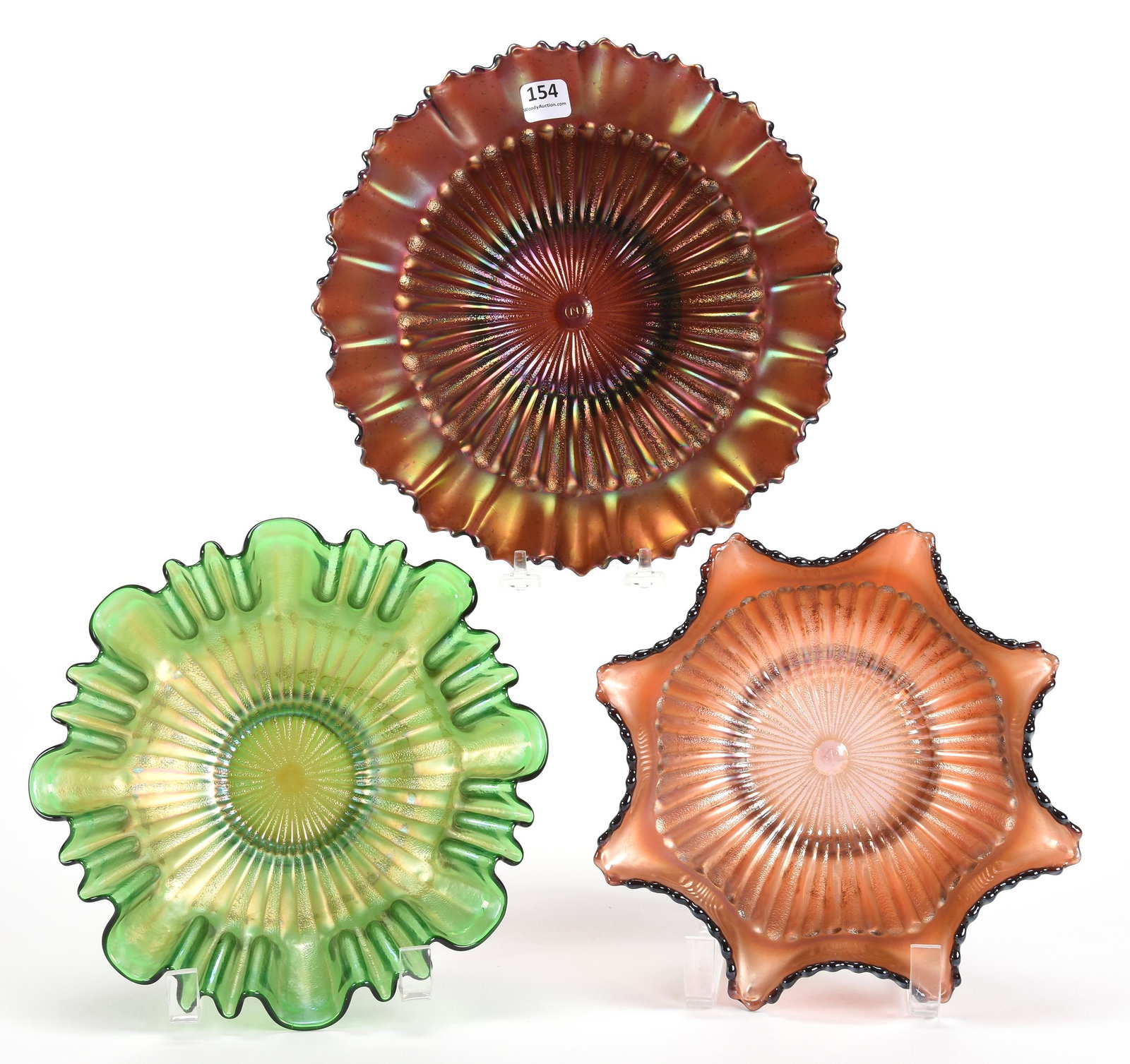 (3) Carnival Glass Bowls, Stippled Rays by Northwood: (3) Carnival glass bowls, Stippled Rays by Northwood; 9.5", 9", 8.75" (1) 9.5" Amethyst, pie crust edge - Nice; (1) 9" Green, 3n1; (1) 8.75" Amethyst, ruffled; Don Anderson Collection, Kansas