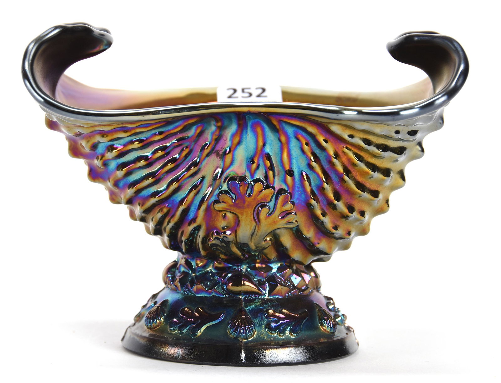 Carnival Glass Sugar, Nautilus Pattern by Dugan: Carnival glass sugar, Nautilus pattern by Dugan; 4" x 5.5" Purple, nice iridescence; Don Anderson Collection, Kansas