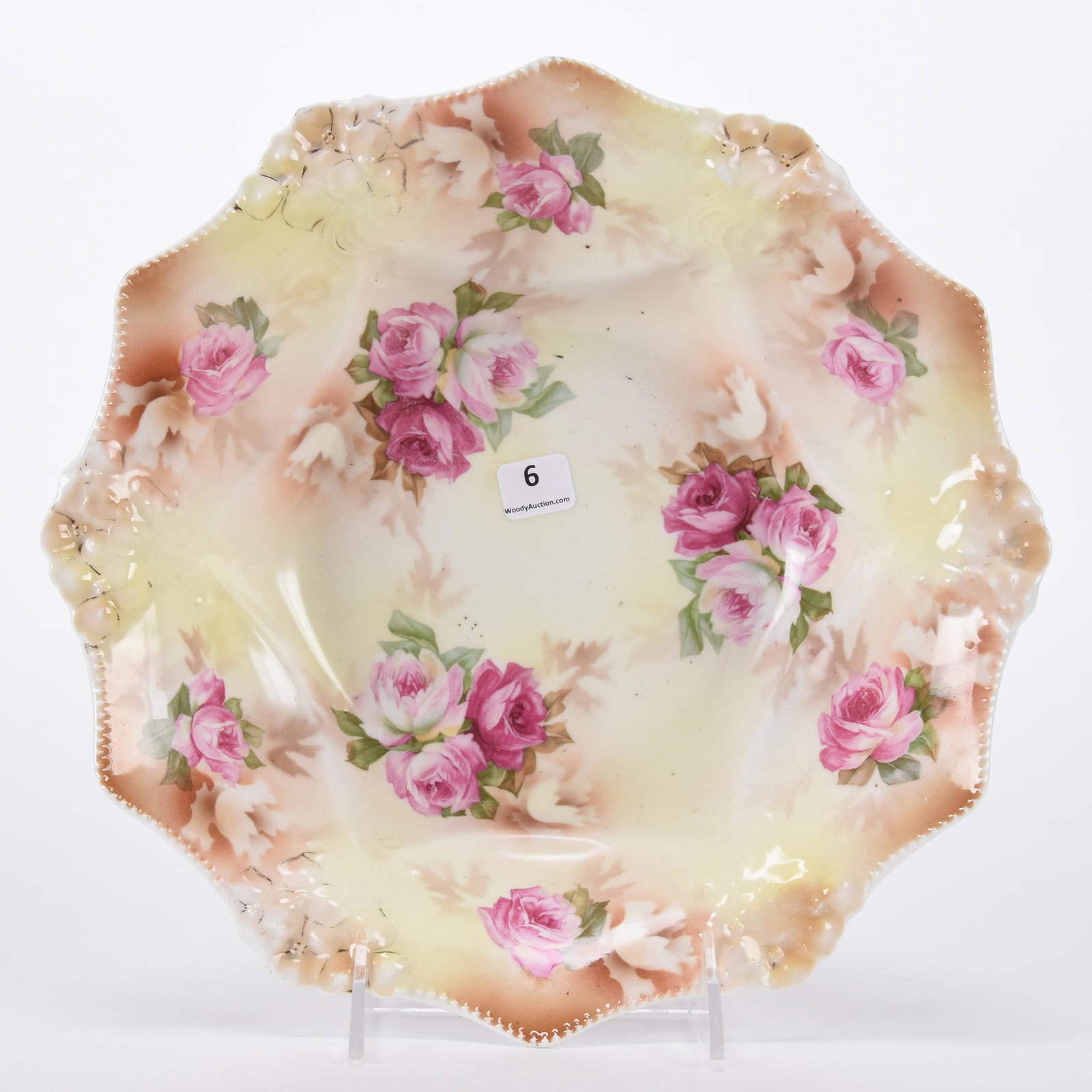 Bowl marked R.S. Prussia: Bowl marked R.S. Prussia; 11" Floral mold, yellow and brown tones, pink rose decor; Hopper Collection, Kansas