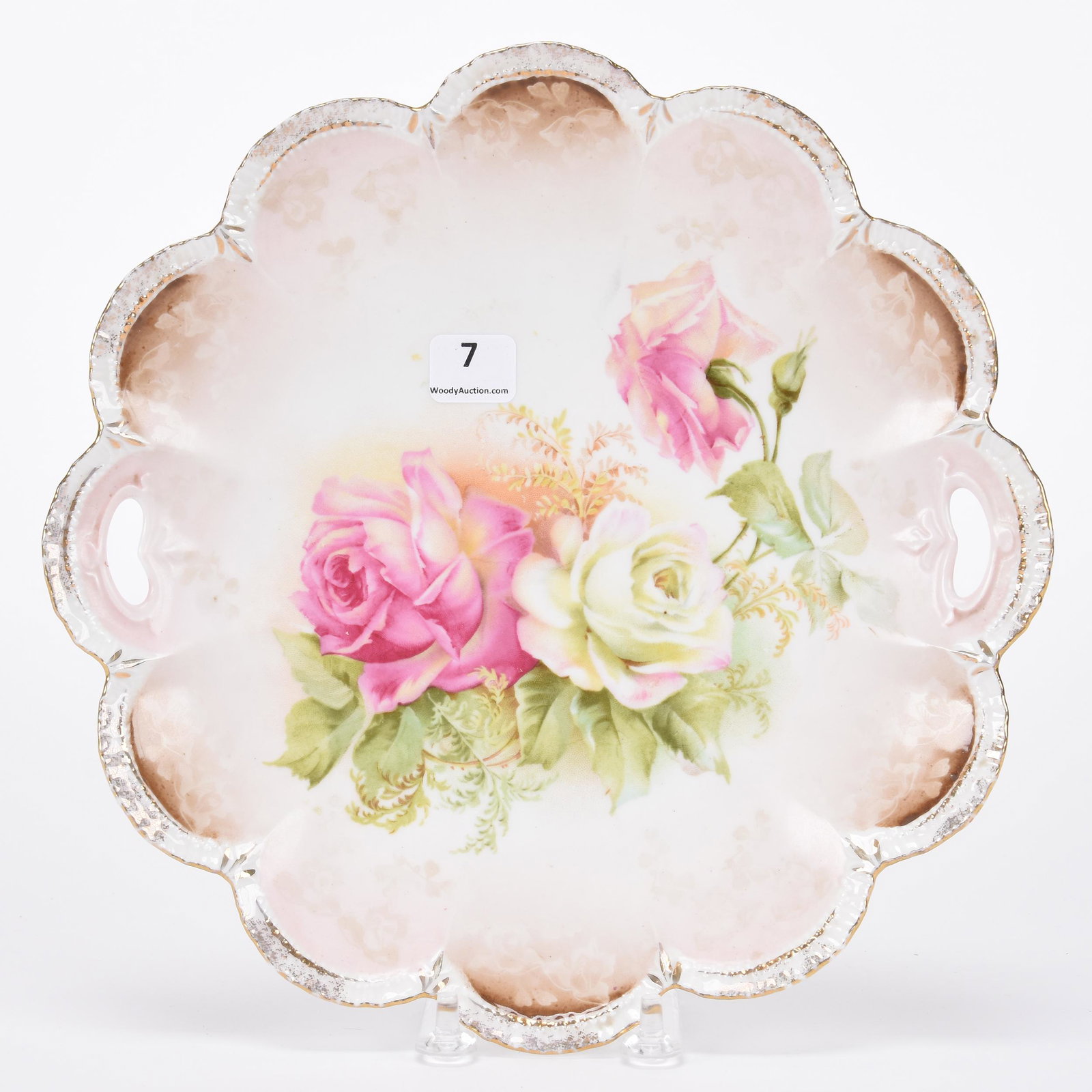 Cake plate marked R.S. Prussia: Cake plate marked R.S. Prussia; 10" Scallop mold, pink, white and brown tones, pink and white rose decor; Hopper Collection, Kansas