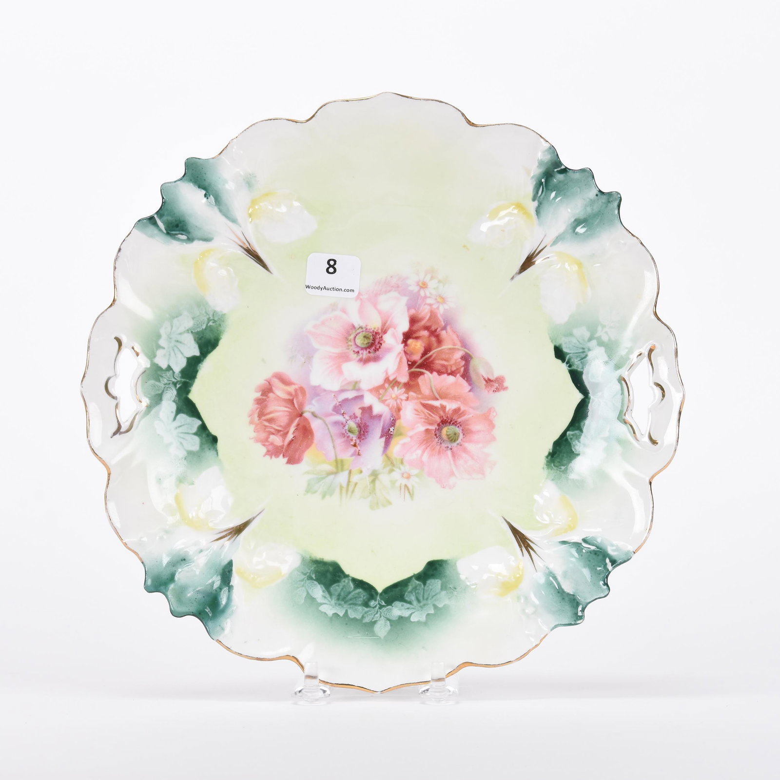 Cake plate marked R.S. Prussia: Cake plate marked R.S. Prussia; 9.5" Iris mold, green, white and yellow tones, pink poppy decor ; Hopper Collection, Kansas