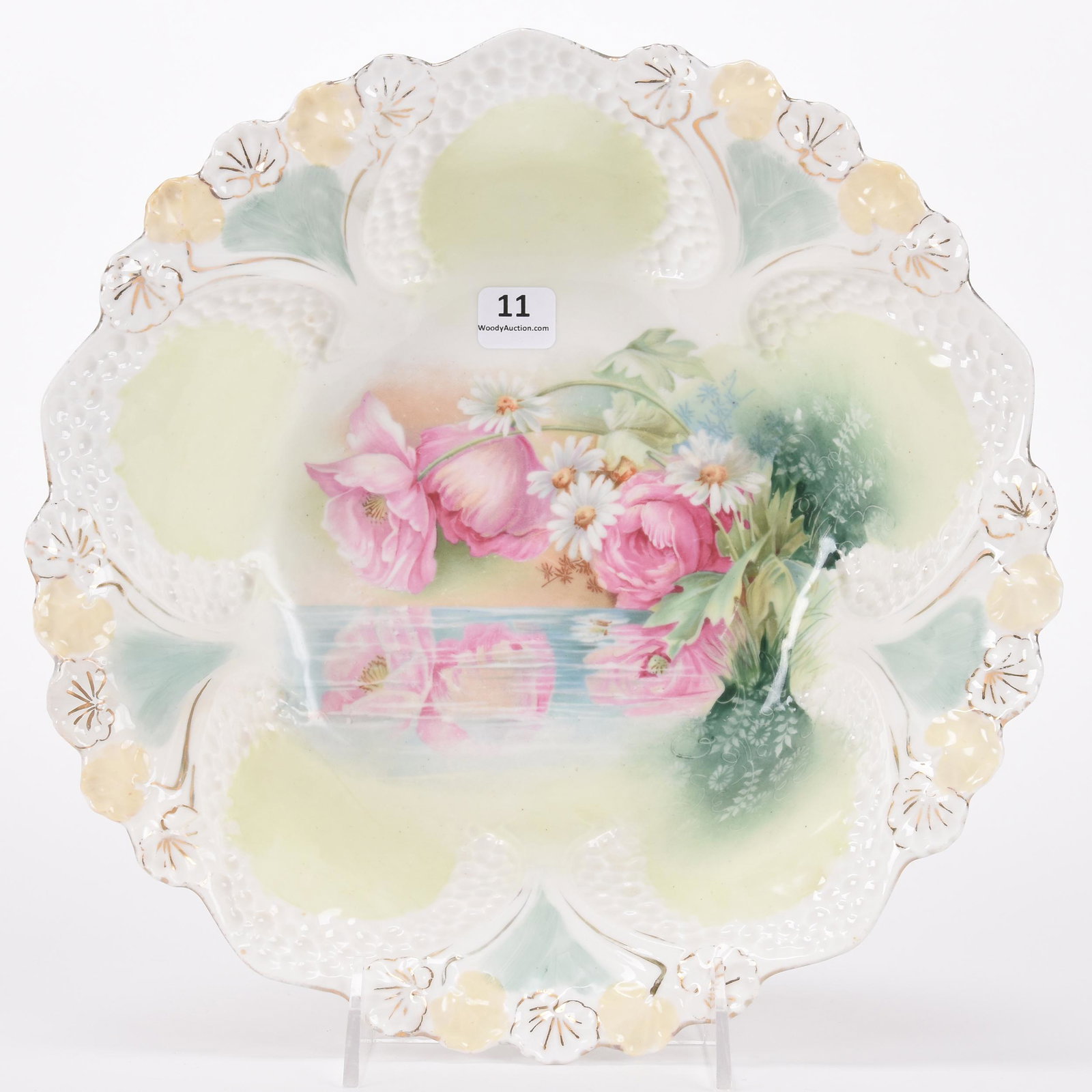 Bowl marked R.S. Prussia: Bowl marked R.S. Prussia; 10.5" Floral and honeycomb mold, green, blue and white tones, reflecting floral decor; Hopper Collection, Kansas