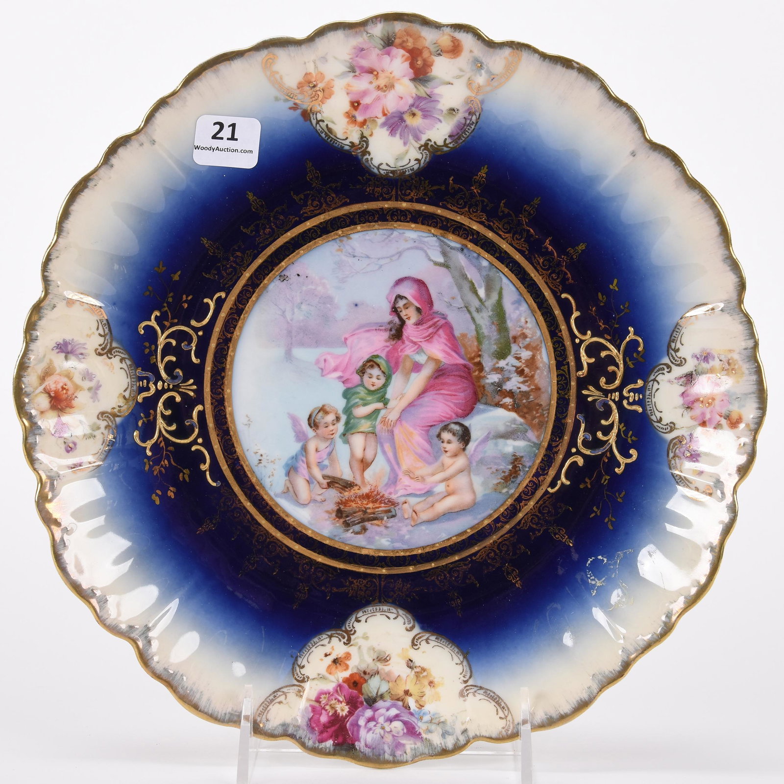 Plate marked Bavaria: Plate marked Bavaria; 10" Cobalt blue and white, winter scene of woman and three cherubs, floral and gold stencil highlights; Hopper Collection, Kansas