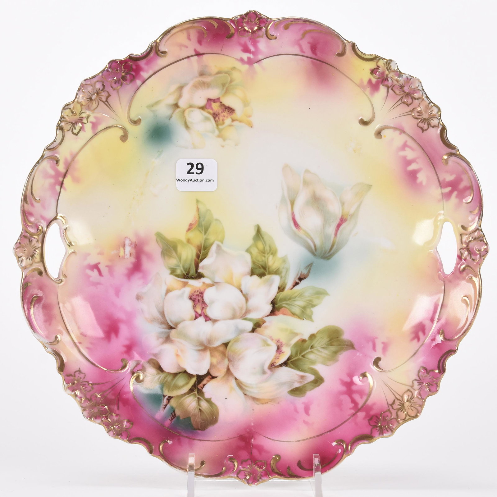 Cake plate marked R.S. Prussia: Cake plate marked R.S. Prussia; 9.75" Pink and yellow tones with magnolia decor; Hopper Collection, Kansas