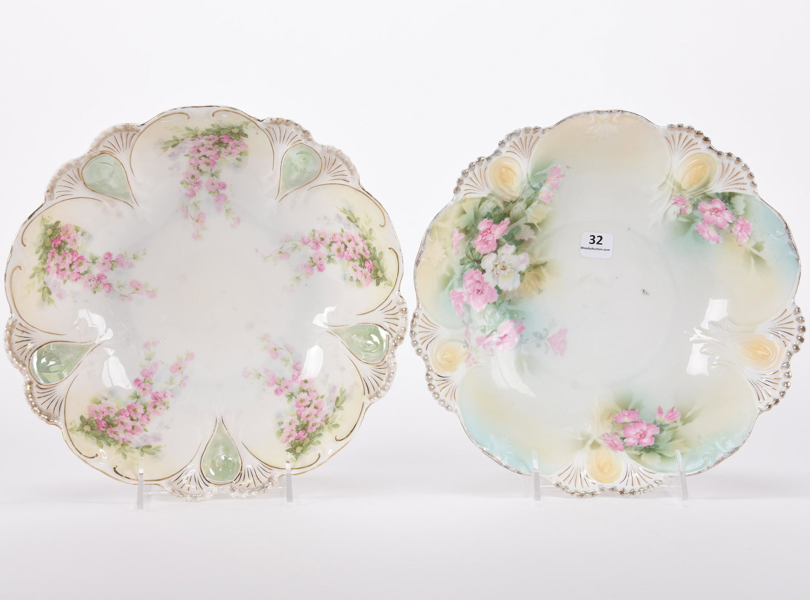 (2) Bowls, both marked R.S. Prussia: (2) Bowls, both marked R.S. Prussia; 10" Same mold, (1) cream and green tones with floral decor; (1) white, cream and green tones with pink floral decor, lustre finish; Hopper Collection, Kansas