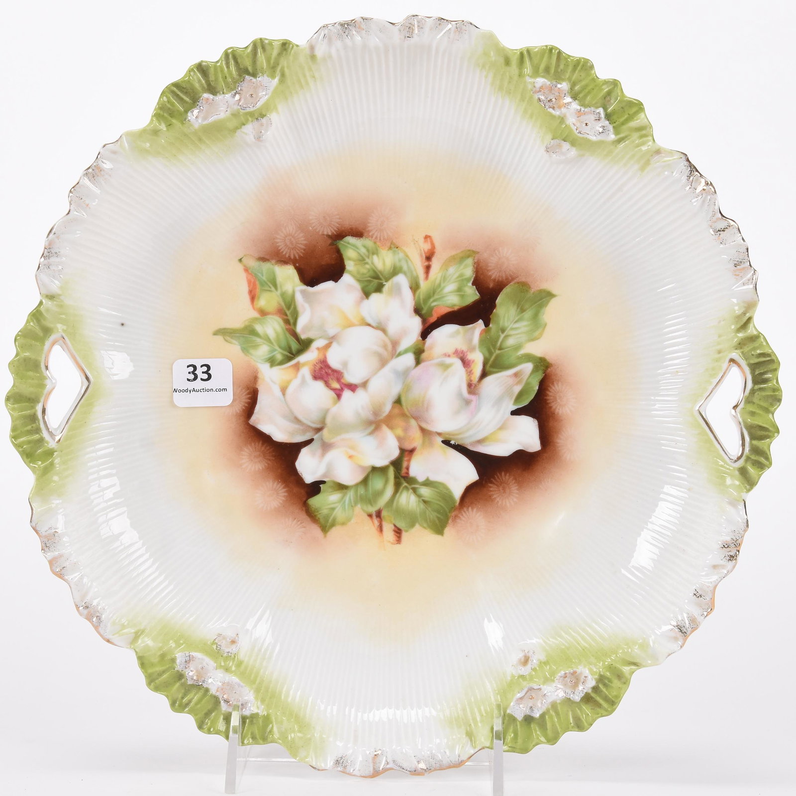Cake plate marked R.S. Prussia: Cake plate marked R.S. Prussia; 10.75" Brown, white and green tones, magnolia decor; Hopper Collection, Kansas