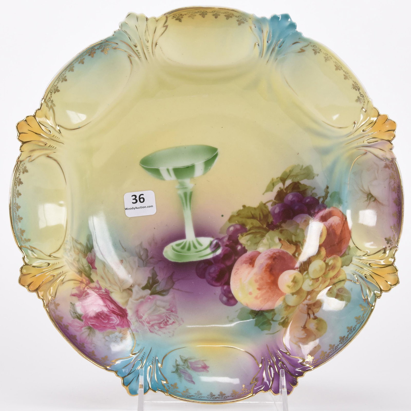 Bowl marked R.S. Prussia: Bowl marked R.S. Prussia; 11" Yellow, lavender and blue tones, champagne glass with fruit decor; Hopper Collection, Kansas