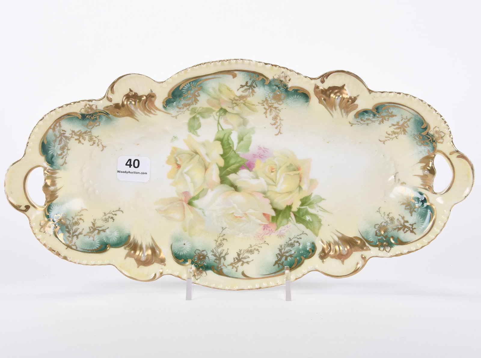 Celery tray marked R.S. Prussia: Celery tray marked R.S. Prussia; 12" Yellow and green tones, yellow and white rose decor, gold stencil highlights; Hopper Collection, Kansas