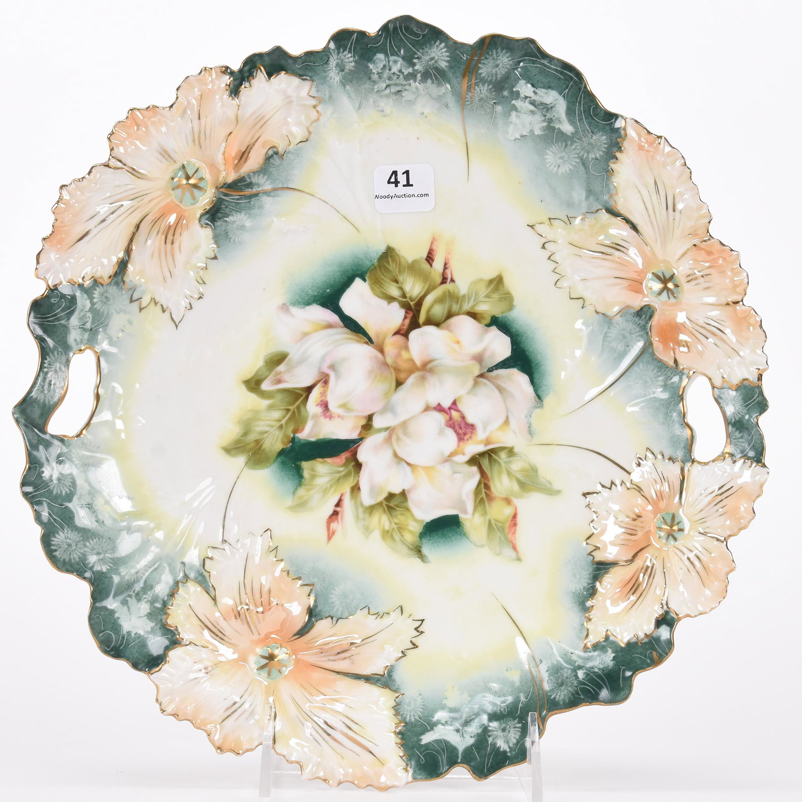 Cake plate marked R.S. Prussia: Cake plate marked R.S. Prussia; 10.5" Carnation mold, green, yellow, white and peach tones, magnolia decor, lustre finish highlights; Hopper Collection, Kansas