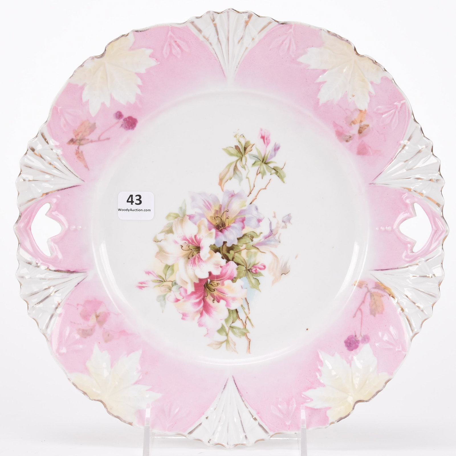 Cake plate, unmarked Prussia: Cake plate, unmarked Prussia; 10.25" Leaf mold, pink and white tones, wild floral decor ; Hopper Collection, Kansas