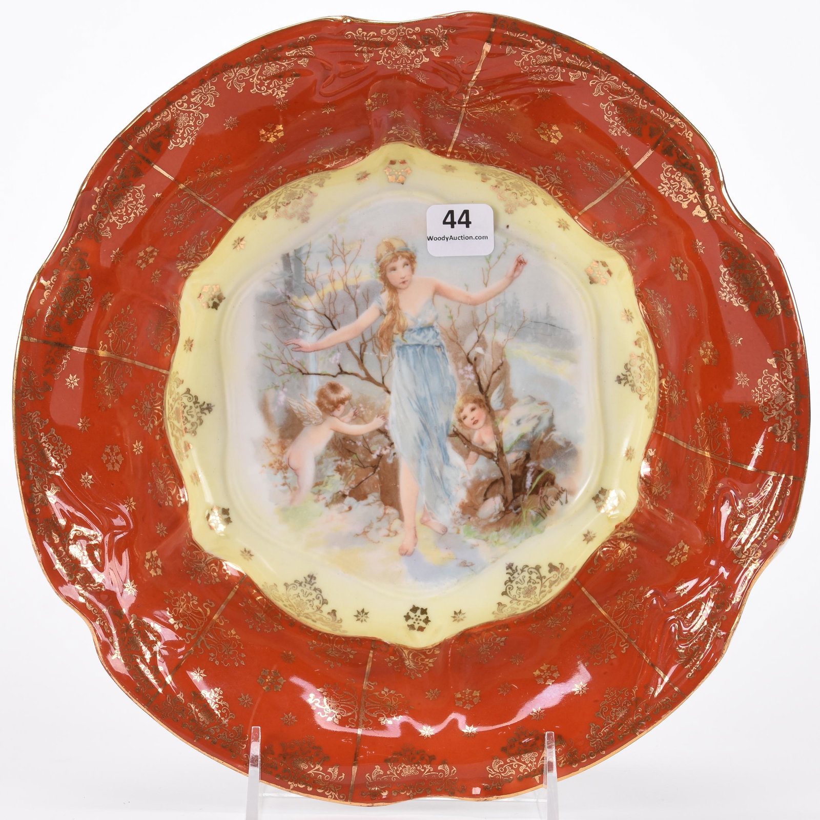 Bowl with green beehive mark, probably Bavaria: Bowl with green beehive mark, probably Bavaria; 10" Yellow and orange border, scene of woman and cherubs, gold stencil highlights; Hopper Collection, Kansas