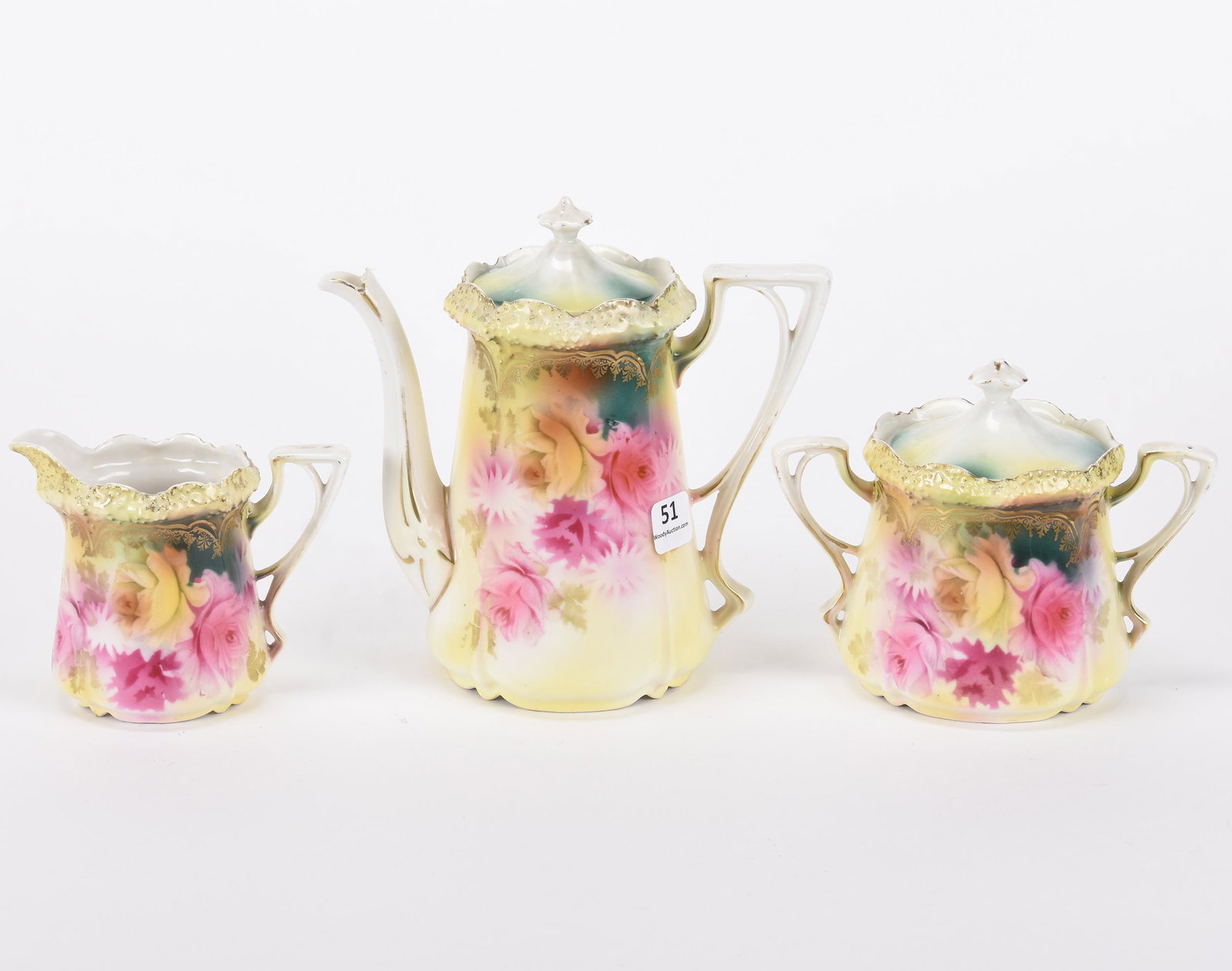 Tea Set, three piece, marked R.S. Prussia: Tea Set, three piece, marked R.S. Prussia; 6.5" Stippled mold, green and yellow tones, pink and yellow rose decor, includes 6.5" teapot, creamer and sugar; Hopper Collection, Kansas