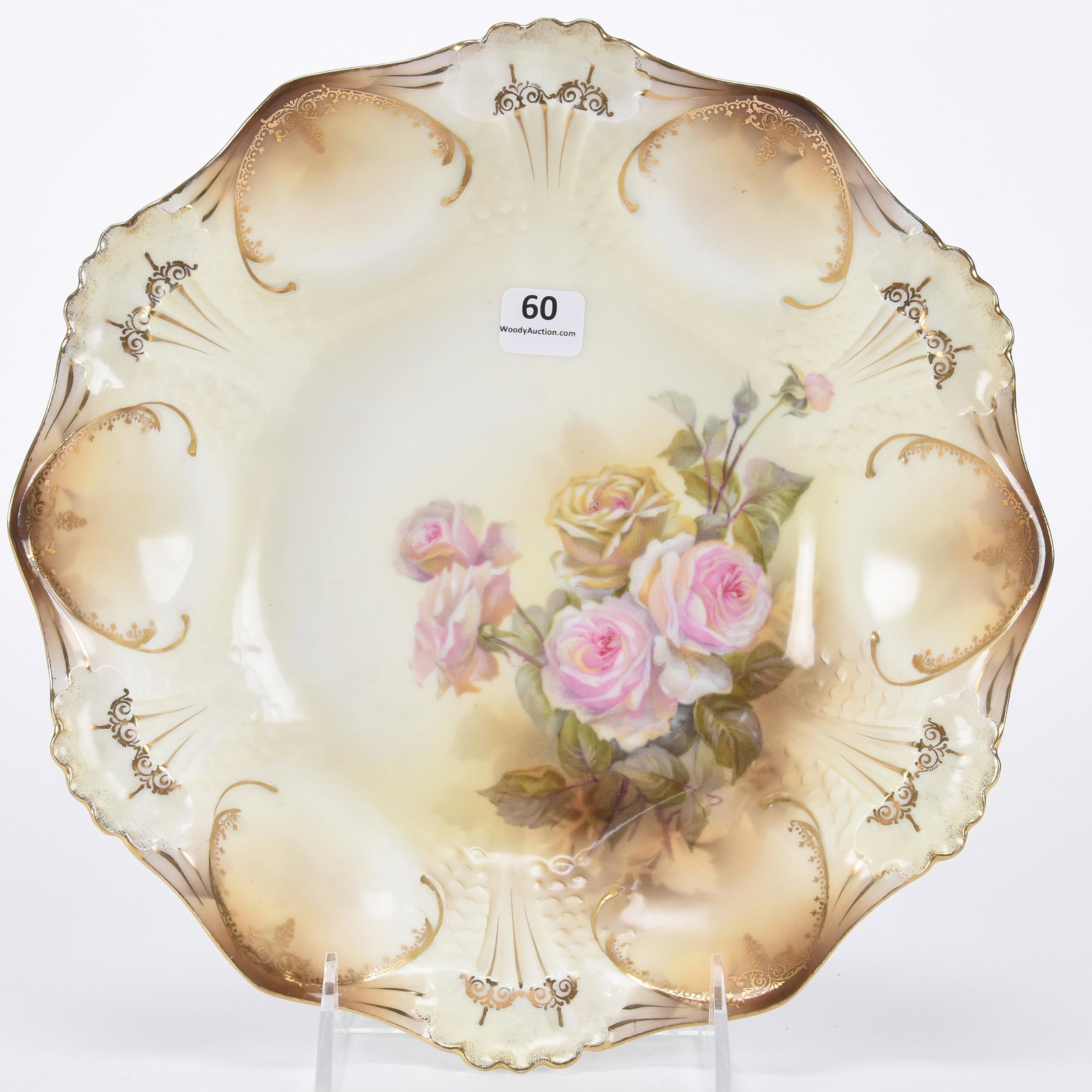 Bowl marked R.S. Prussia: Bowl marked R.S. Prussia; 10" Scale and Dome mold, brown tones with pink and yellow rose decor, gold stencil highlights; Hopper Collection, Kansas
