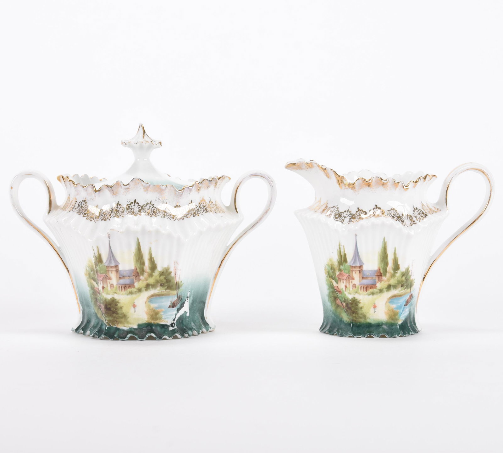 Creamer & sugar set marked R.S. Prussia: Creamer & sugar set marked R.S. Prussia; Six-sided, green and white tones with castle scenic decor, sugar bowl has two interior rim chips ; Hopper Collection, Kansas