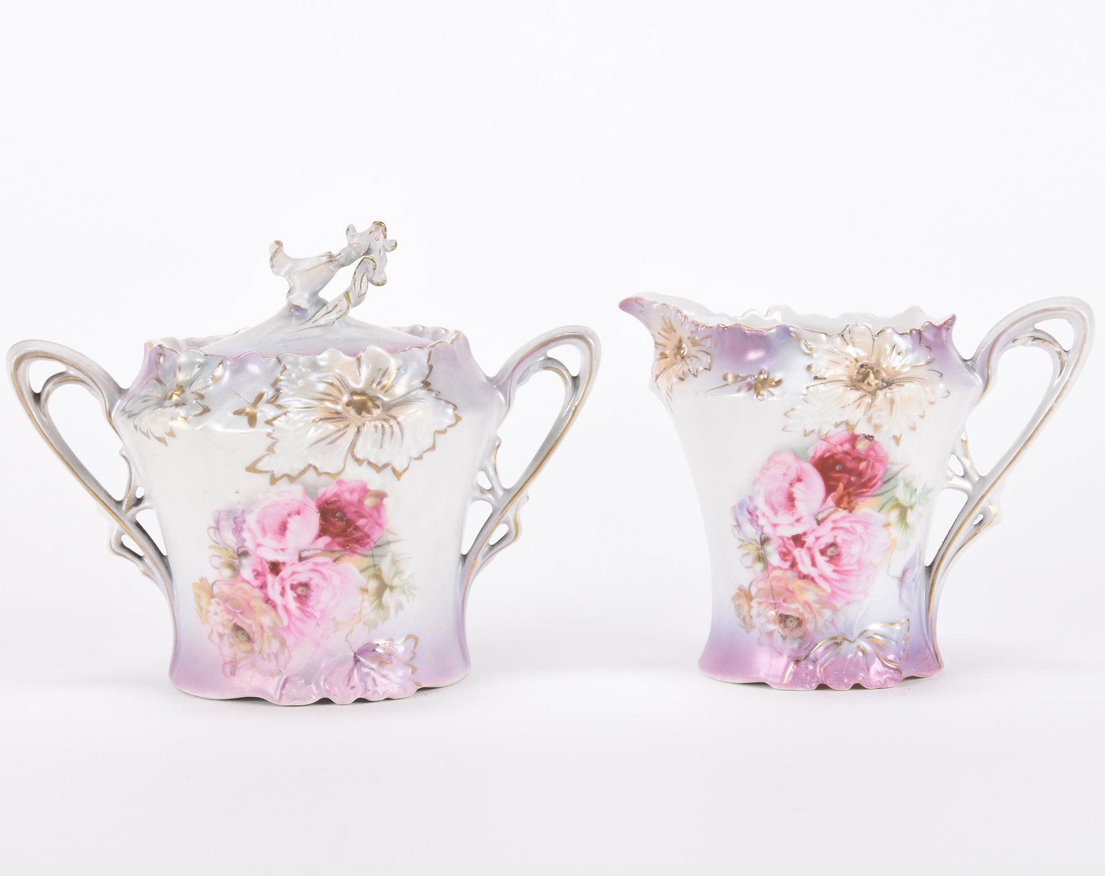 Creamer & sugar set marked R.S. Prussia: Creamer & sugar set marked R.S. Prussia; Carnation mold, white and lavender satin finish with poppy decor, finial repair on sugar lid ; Hopper Collection, Kansas