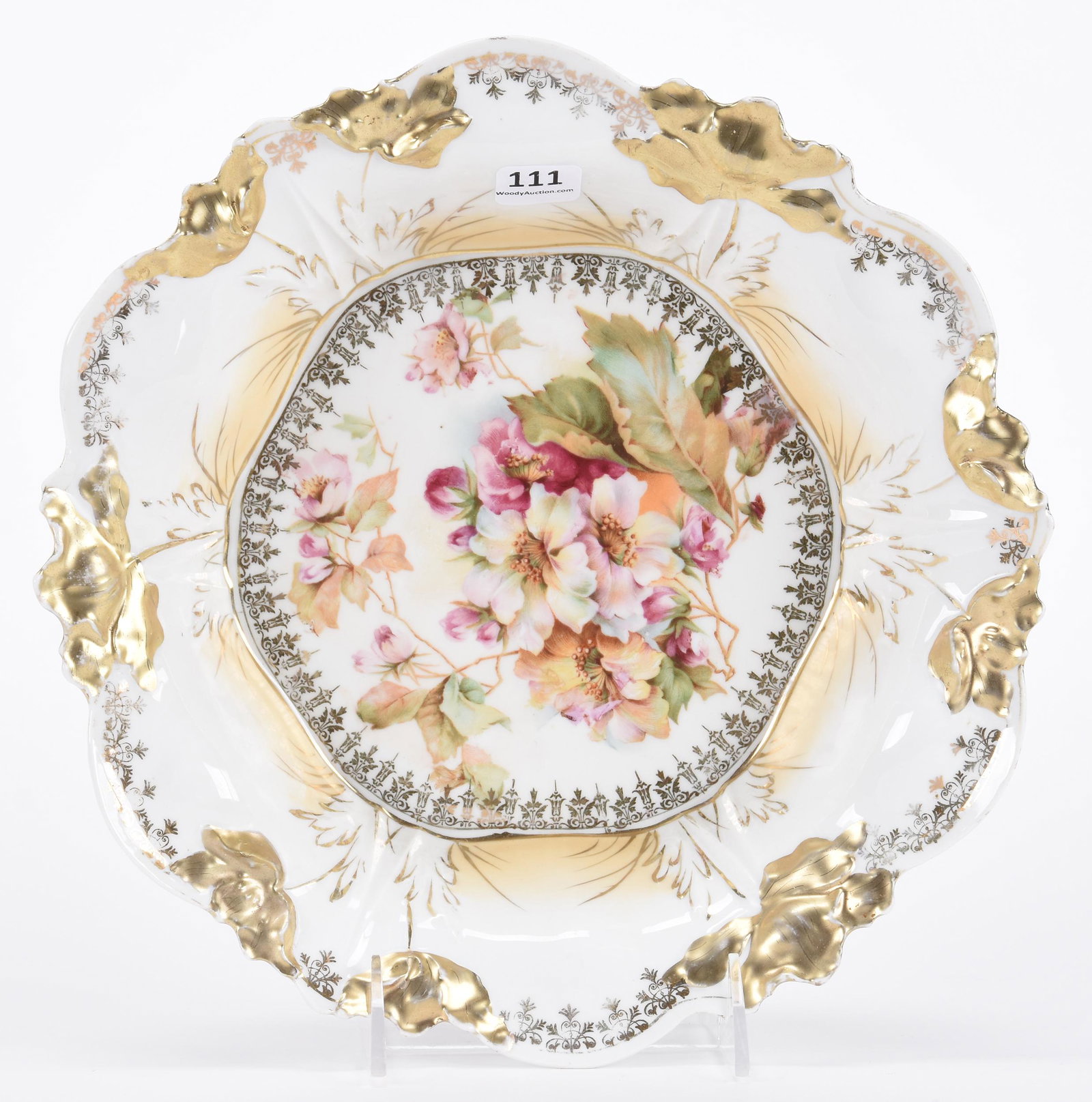 Bowl, unmarked Prussia: Bowl, unmarked Prussia; 10.5" Floral mold, white and cream tones with wild floral decor, heavy gold trim; Hopper Collection, Kansas
