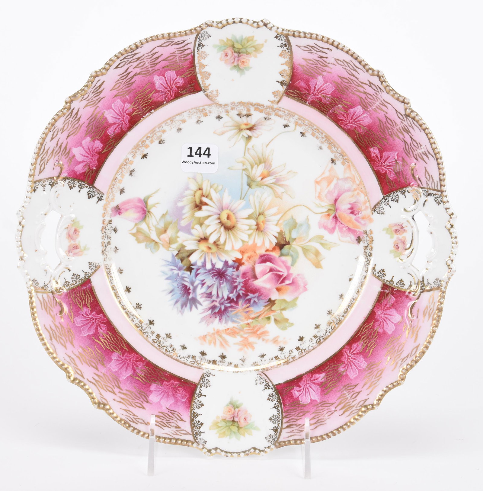 Cake plate, unmarked Prussia: Cake plate, unmarked Prussia; 10.5" White with pink border, wild floral decor, nice gold stencil highlights; Hopper Collection, Kansas
