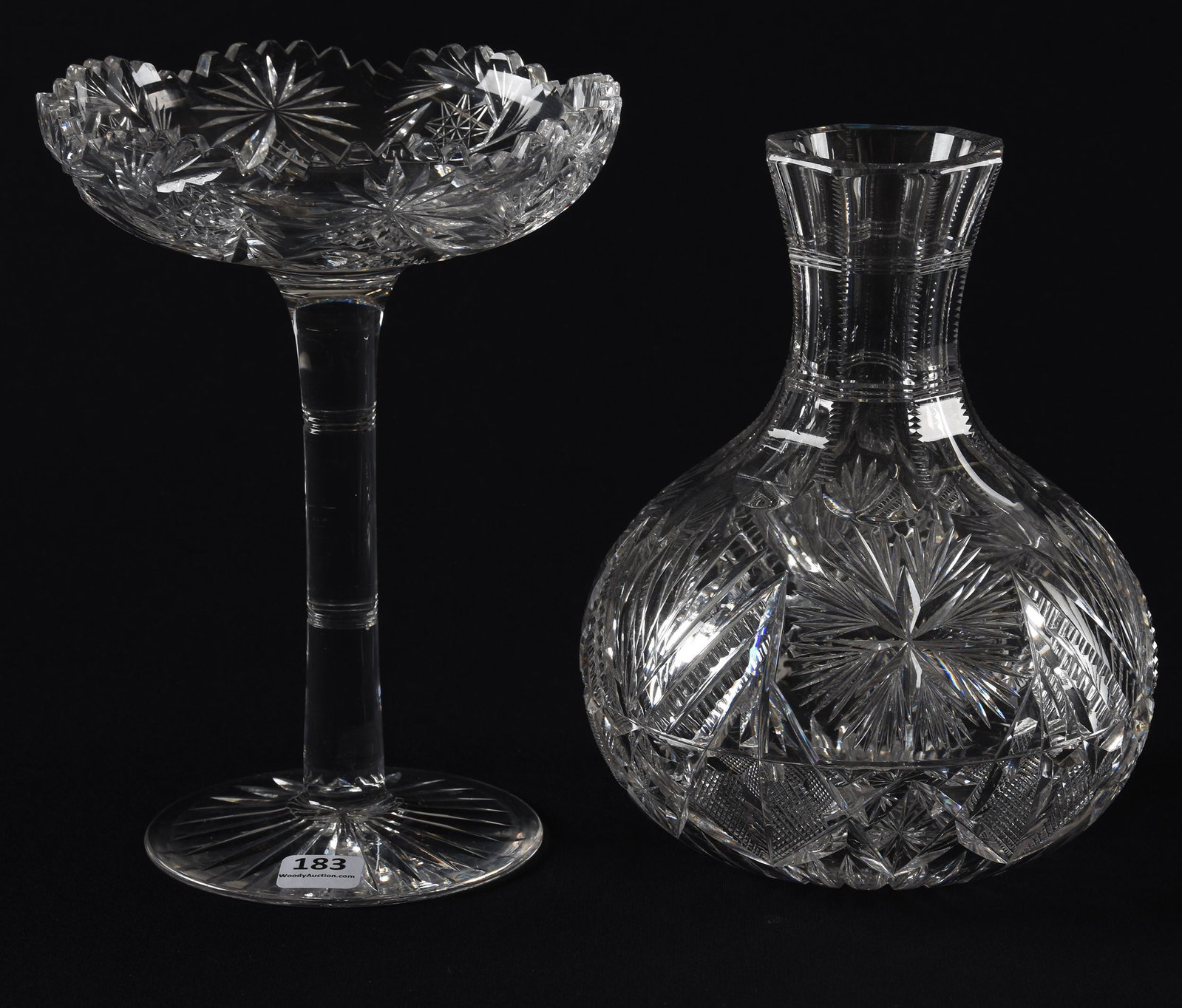 Compote & carafe, American brilliant cut glass: Compote & carafe, American brilliant cut glass; 8.5", 7.75" (1) 8.5" Compote, pinwheel, crosscut diamond and fan motif, solid stem, ray cut foot; () 7.75" Carafe, flashed star, zipper, strawberry diam